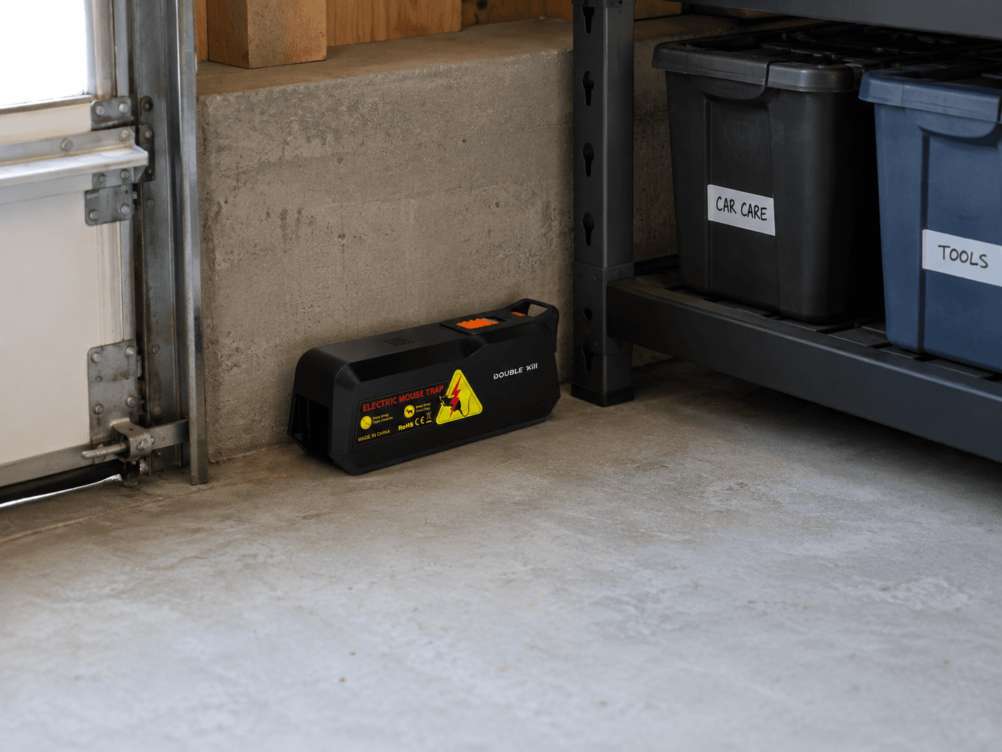 Electric Mouse Trap positioned in a garage
